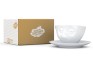 Kaffeetasse verpennt, neben Karton